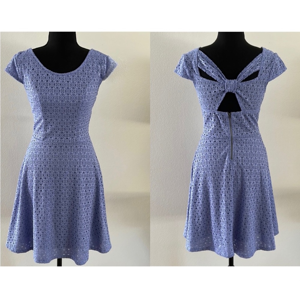 Periwinkle short sleeve fit and flare dress. Eyelet over lay.